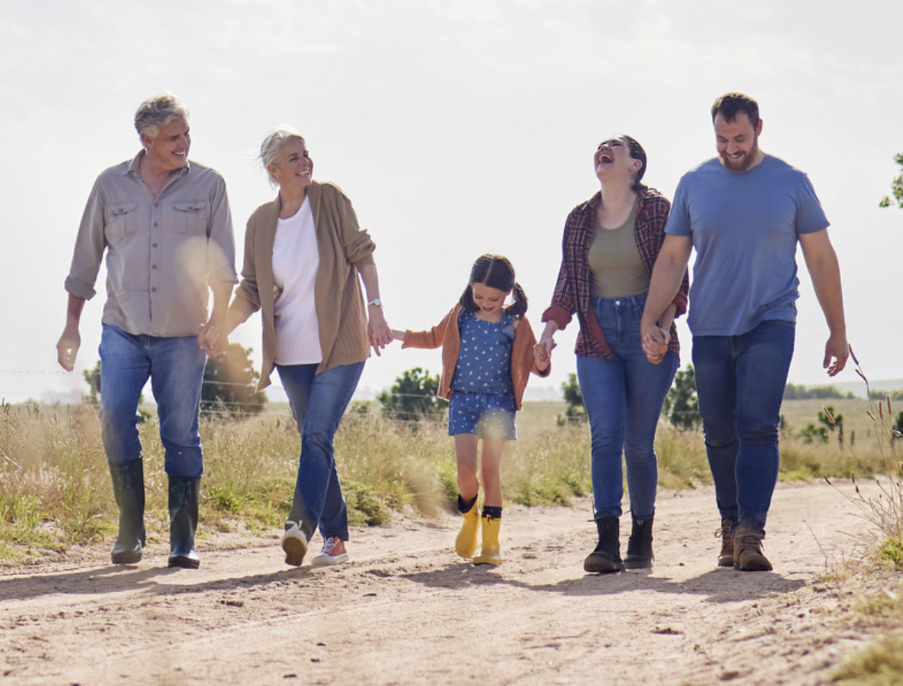 Shot of a multi-generational family walking together on a farm stock photo